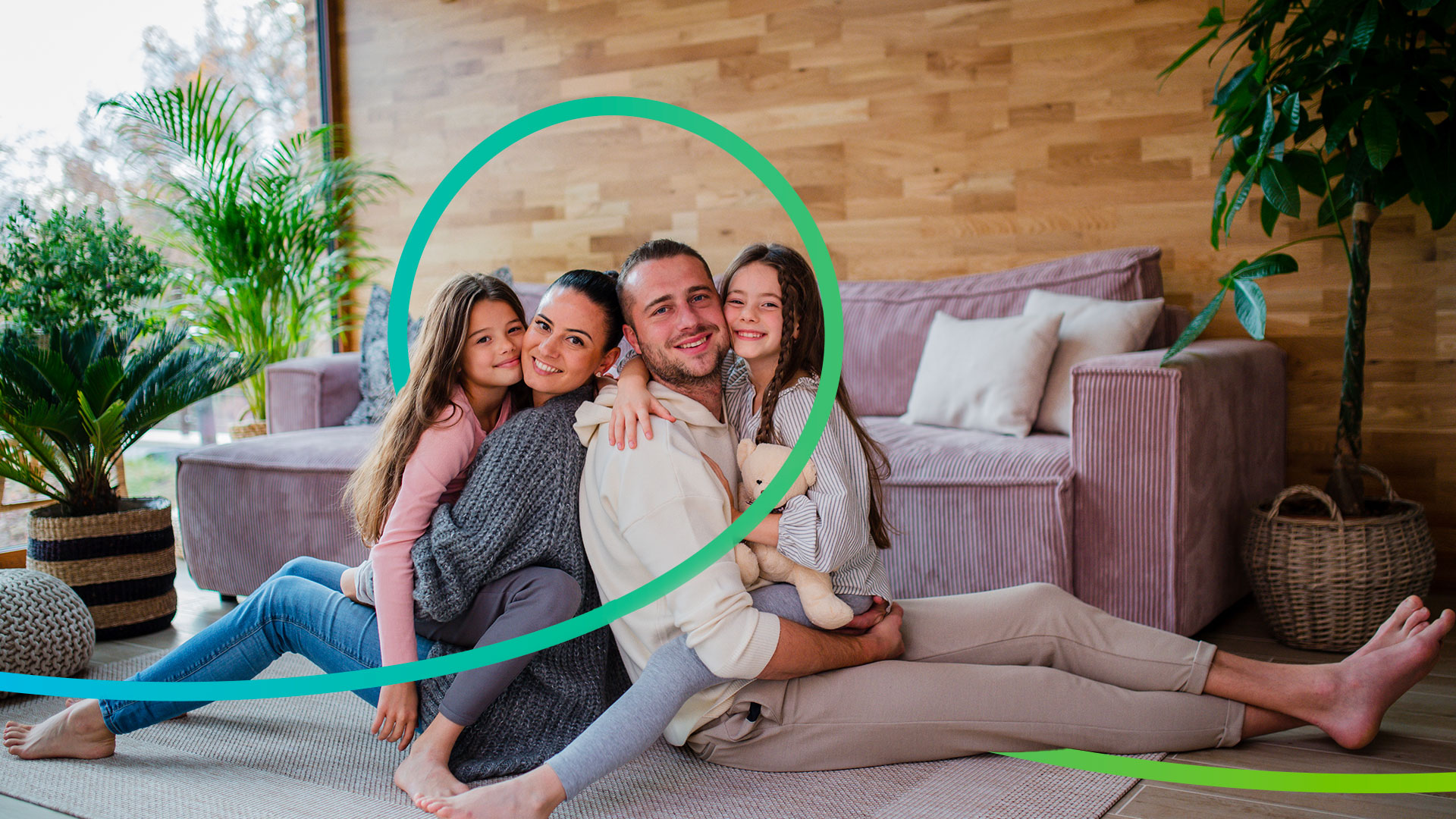 Portrait of a beautiful young family talking and bonding in bed